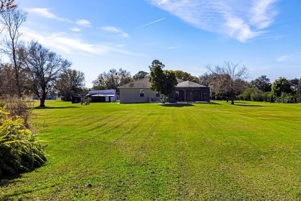 House from back side - to the left are various storage sheds and garages