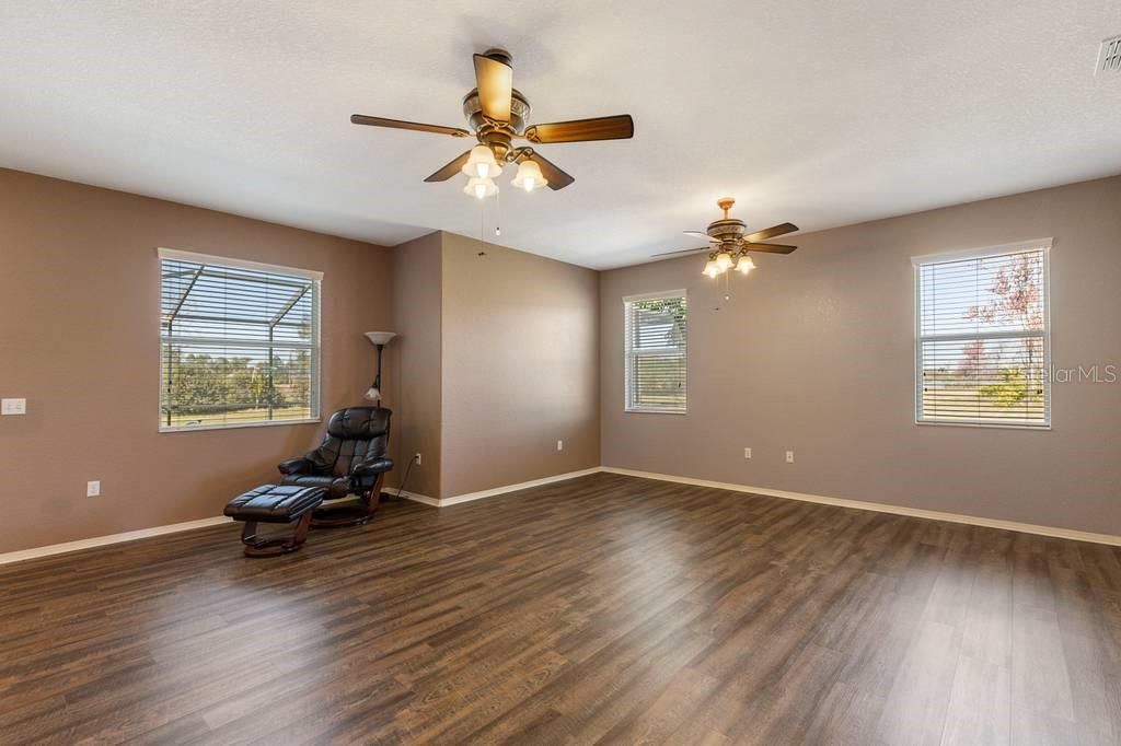 Family Room with window providing views out to backyard and Lake May beyond