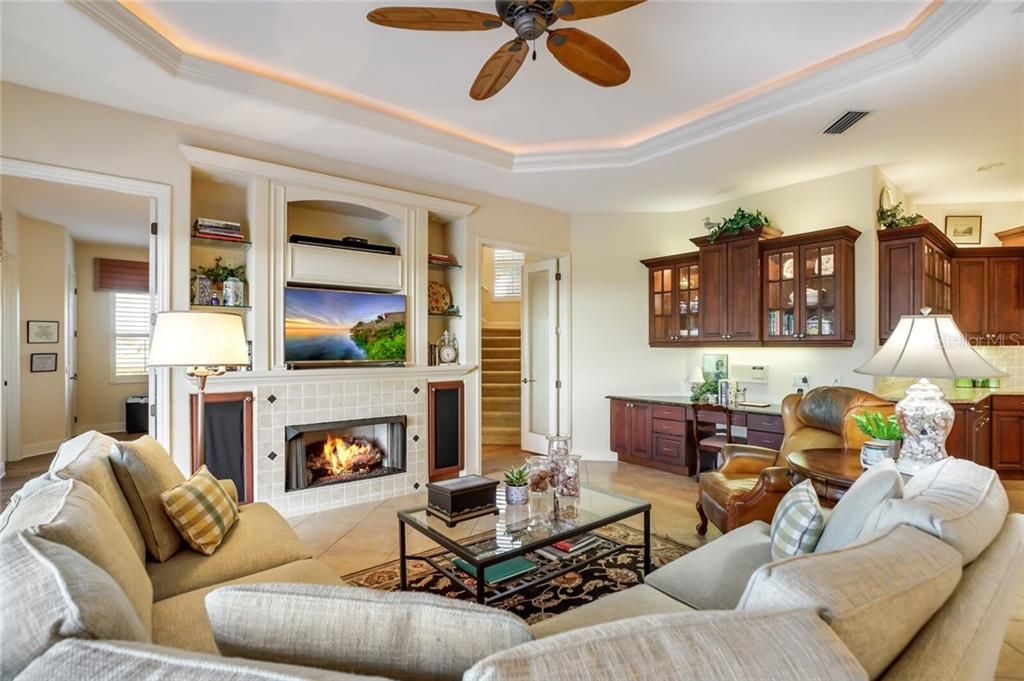 Family room with built-ins and gas fireplace.