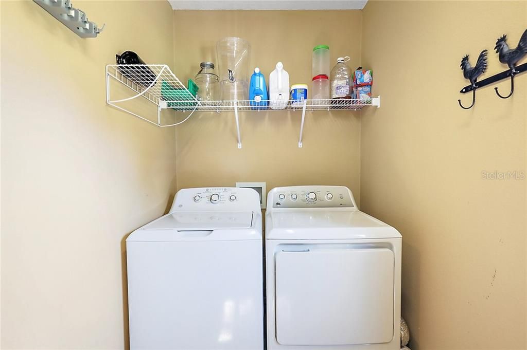 The laundry room also has a sink and a door to the back porch.