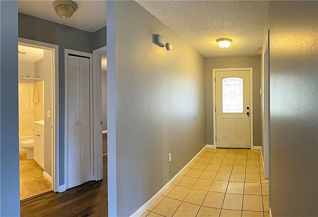 Foyer and hallway to guest beds/bath