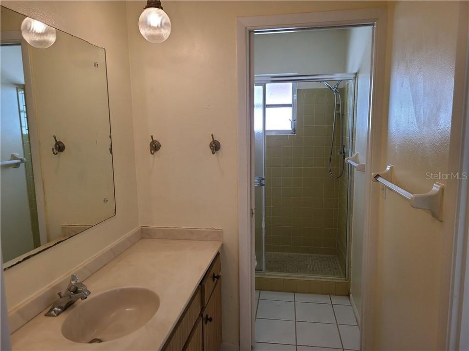 Main Hall Bathroom w/Separated Toilet and Shower Area