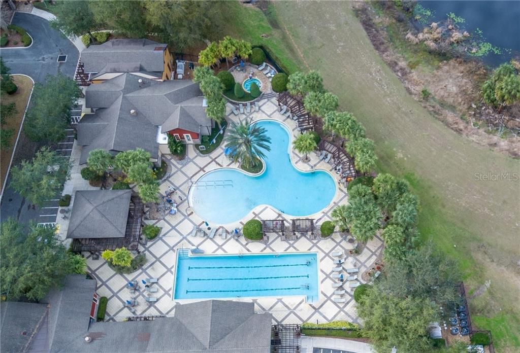 Resort style amenities, heated swimming pool, oversized lap pool and whirlpool spa. Perfect for relaxing in the Florida sunshine.