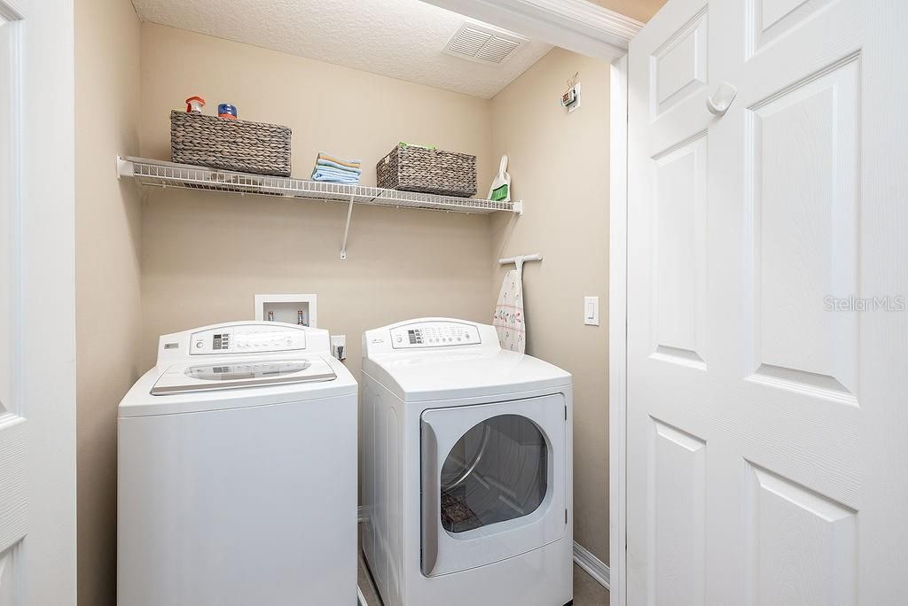 Upstairs laundry with included washer/dryer.