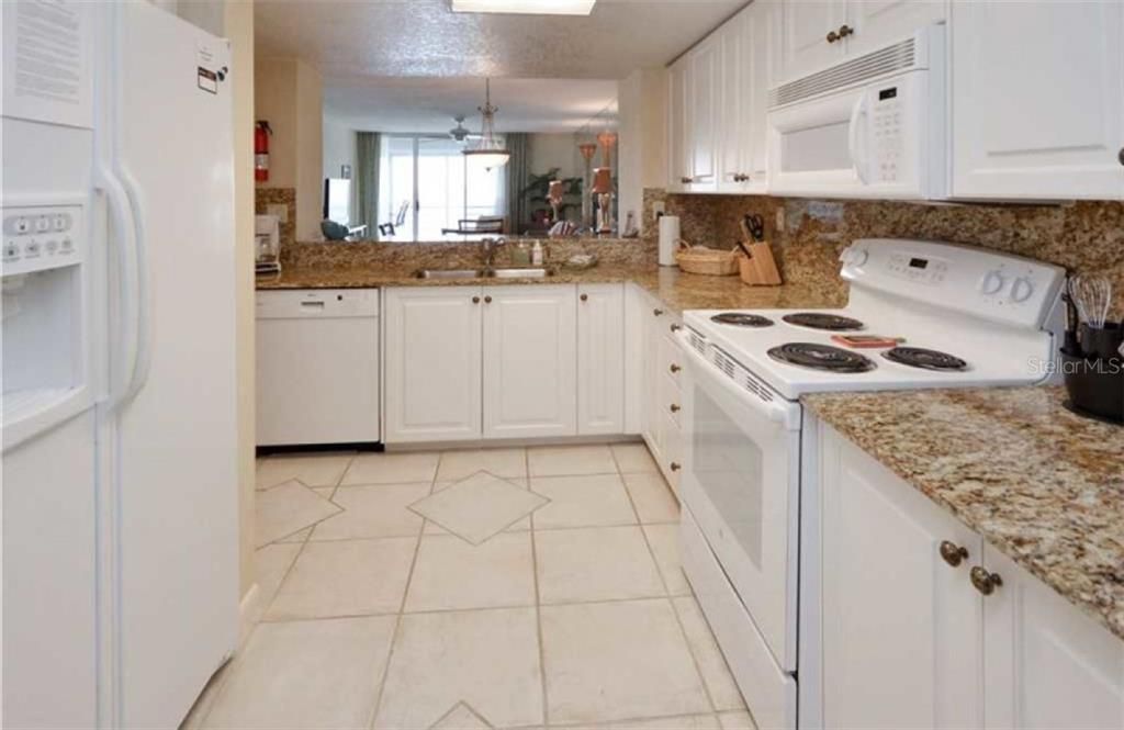 Kitchen with Updated Cabinets and Granite Countertops