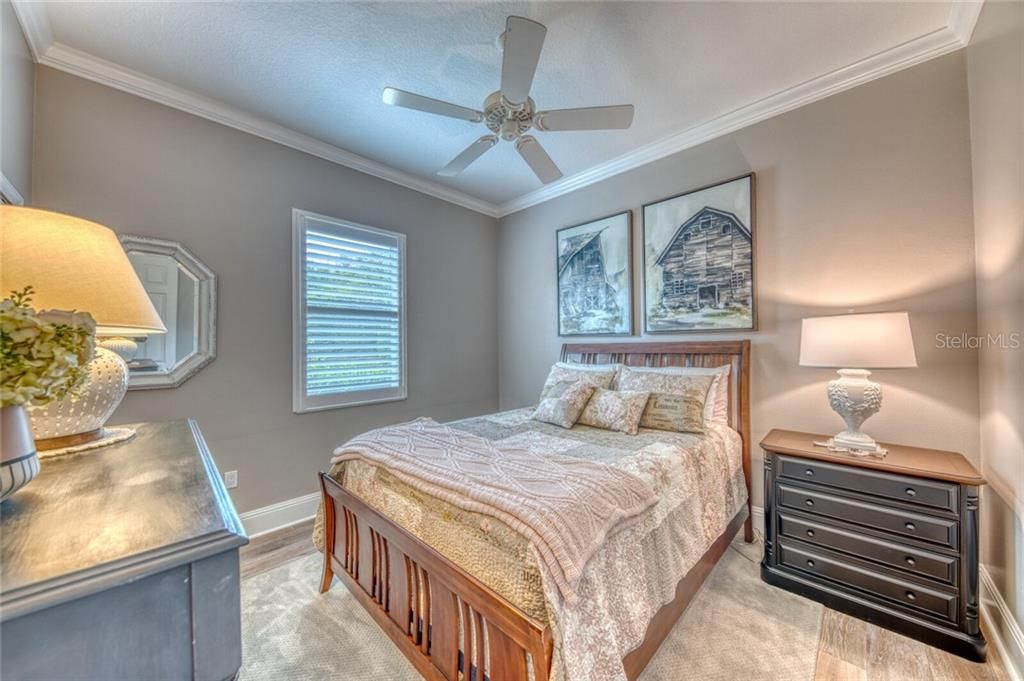 Bedroom 2- Renovated, plantation shutters, hurricane proof windows