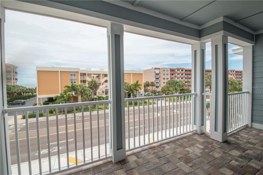 That's the peek-a-boo view of the Gulf & beach. You can walk across Gulf Blvd and be on the sand in mere moments from your front door!!!!