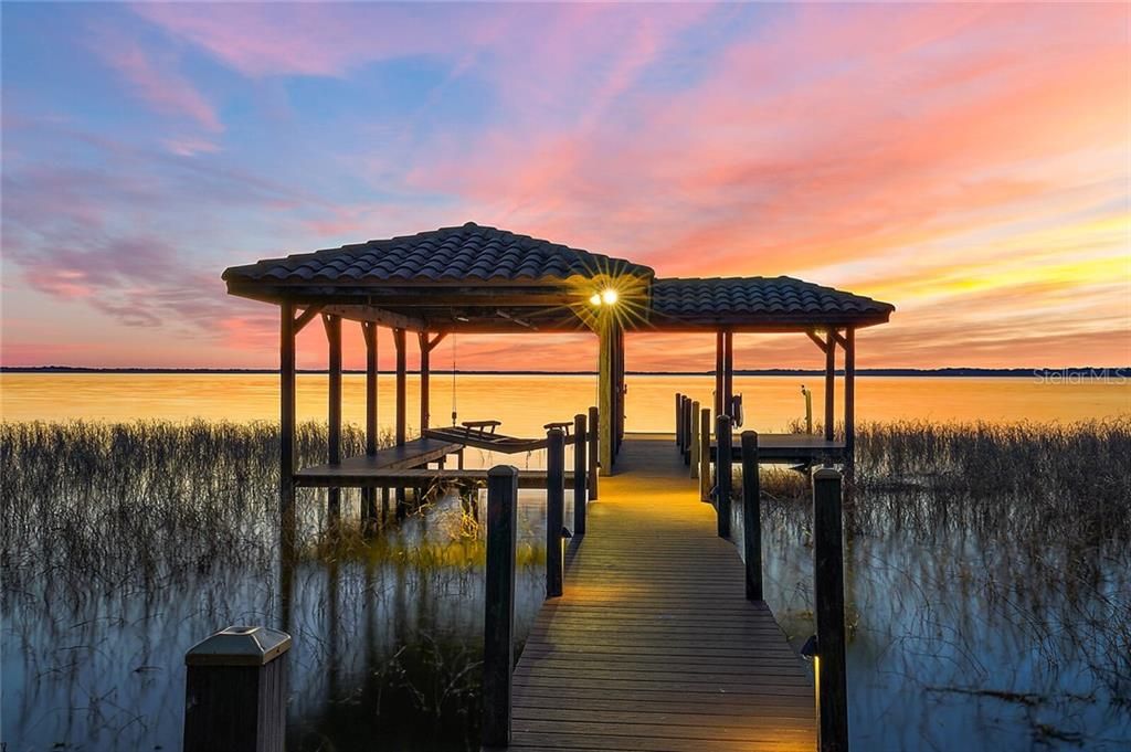 Enjoy breathtaking sunset views from your own waterfront paradise