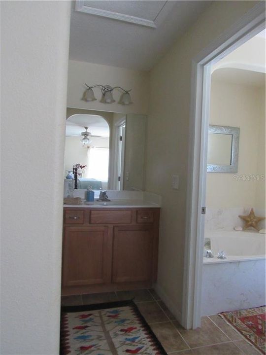 The master bath is in 2 separate sections to help with privacy.