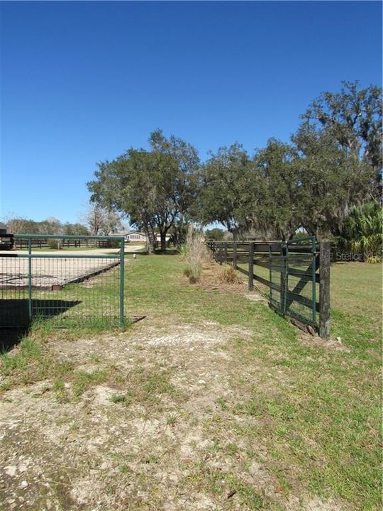 Gate to exit the pasture with equipment or trailers.