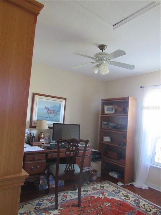 The third bedroom/office has lots of room and natural light.