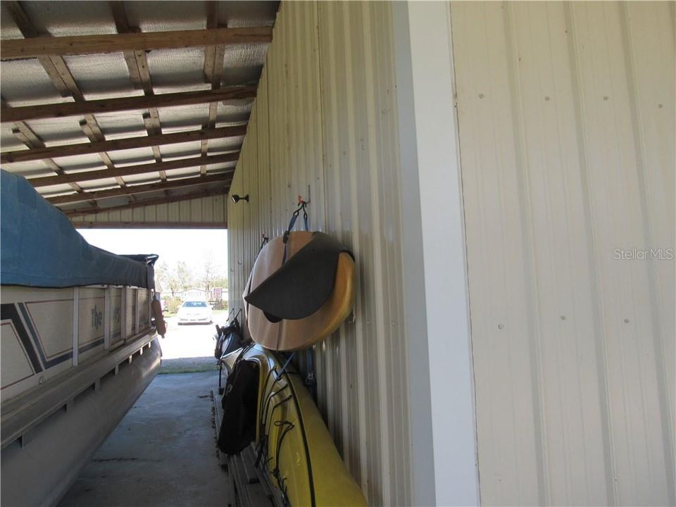 Lots of storage in the covered area of the barn. Park your cars/ trucks/ boats/ heavy equipment.