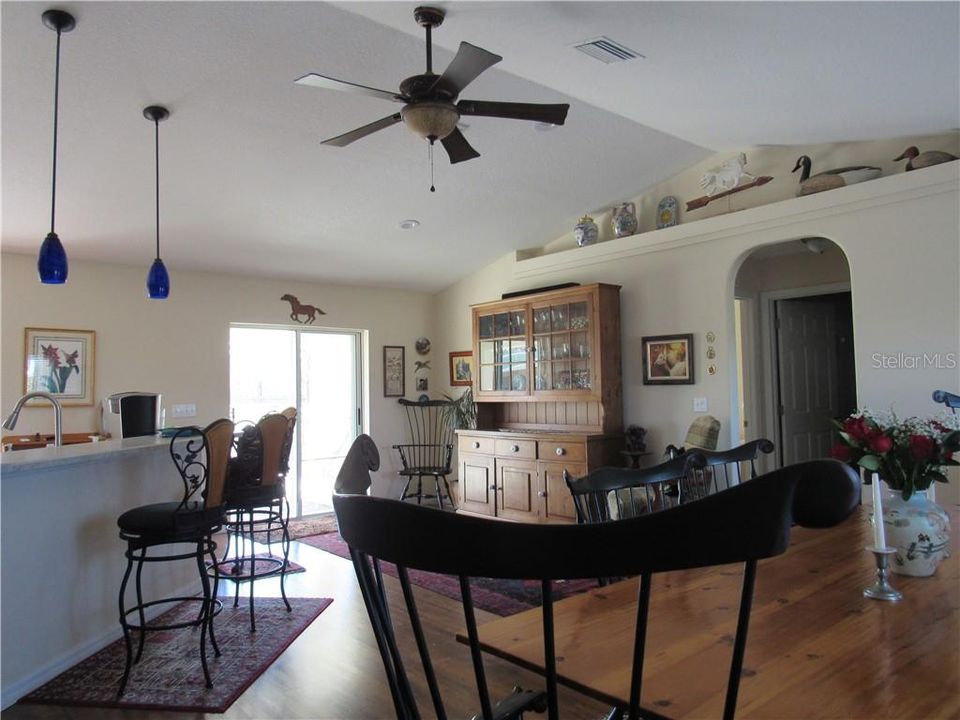 Dining room connects you to the eat in kitchen with more space for your collectibles and family/friends to gather.