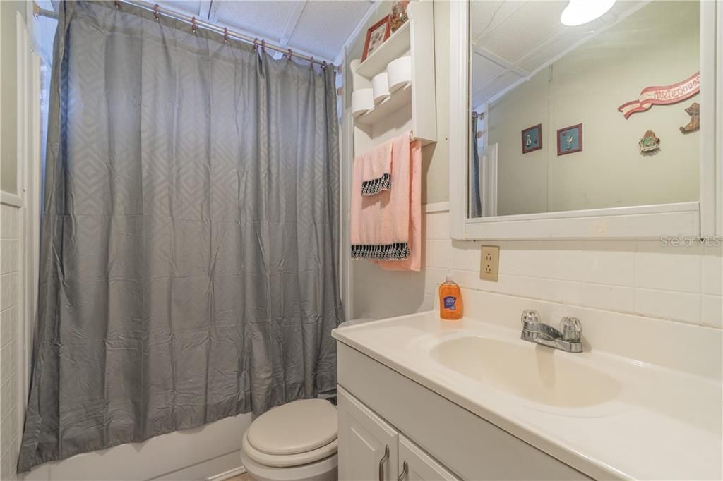 Guest bathroom by secondary bedrooms