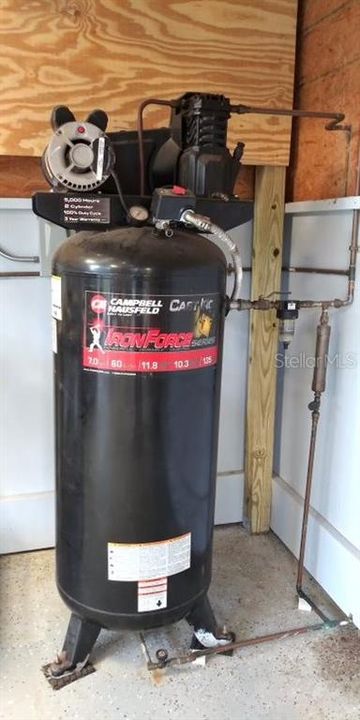 air compressor in big red workshop