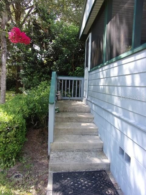 Entrance onto front porch of home