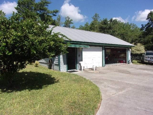 3 Car Garage with half bath