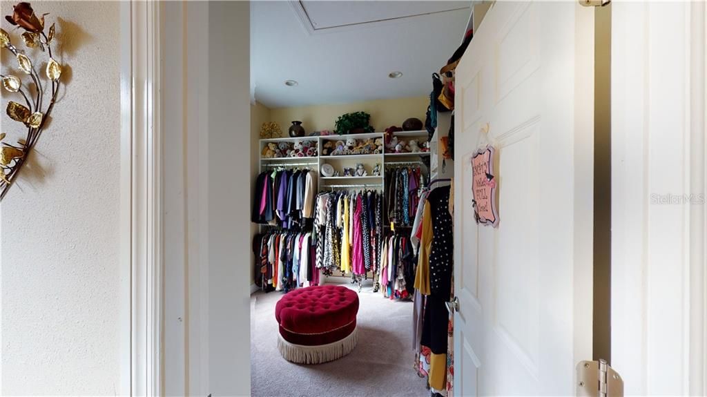 Custom master closet is the great place to hide away.