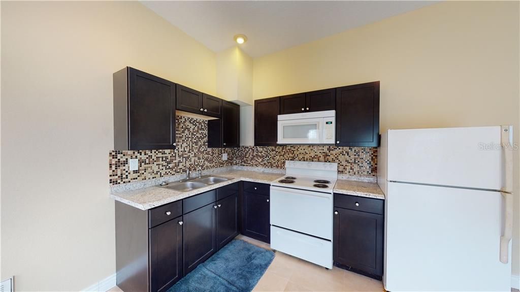A full kitchen makes this a great place for your guest, a renter, or your older child(ren).