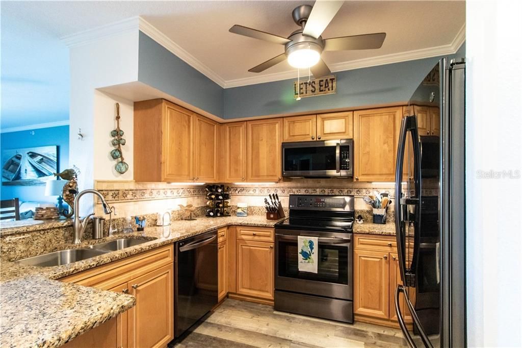 recently renovated kitchen with granite, stainless steel appliances and more.