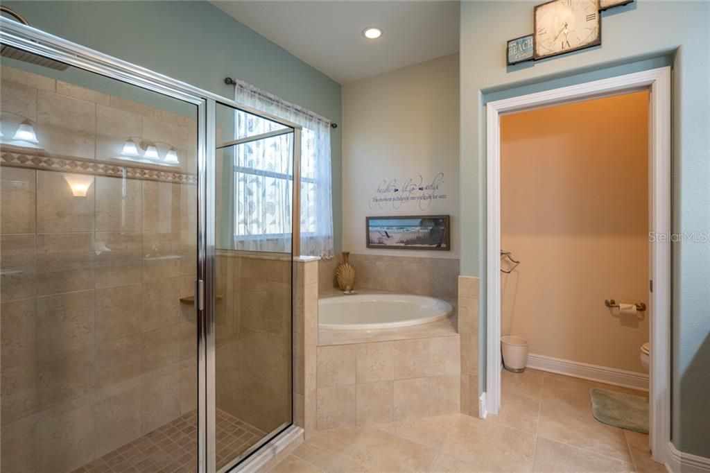 MASTER BATH WITH DEEP GARDEN TUB AND LARGE SHOWER