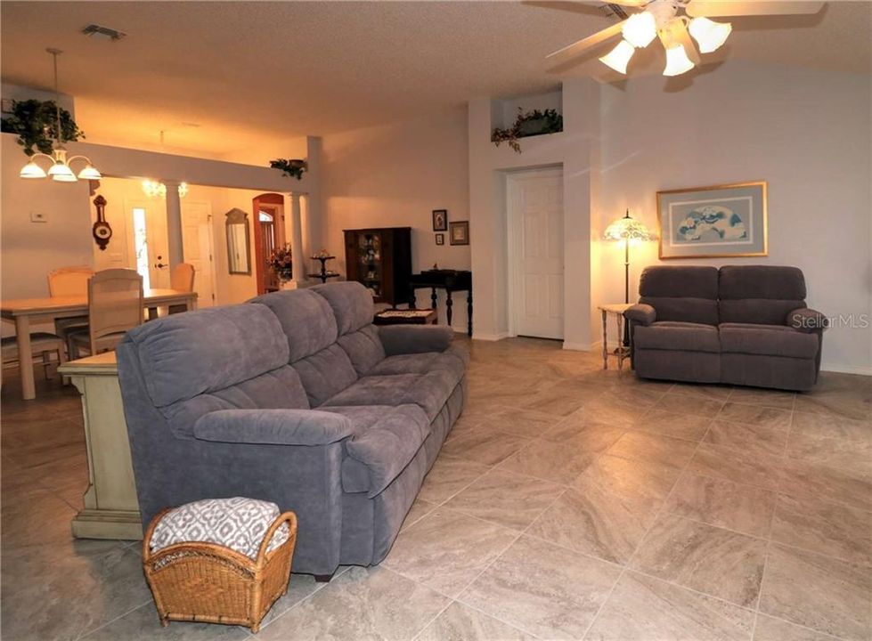 Living room has tile as does the entire home.. no carpet.