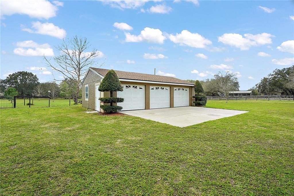 Detached 3-Car Garage and Parking Pad