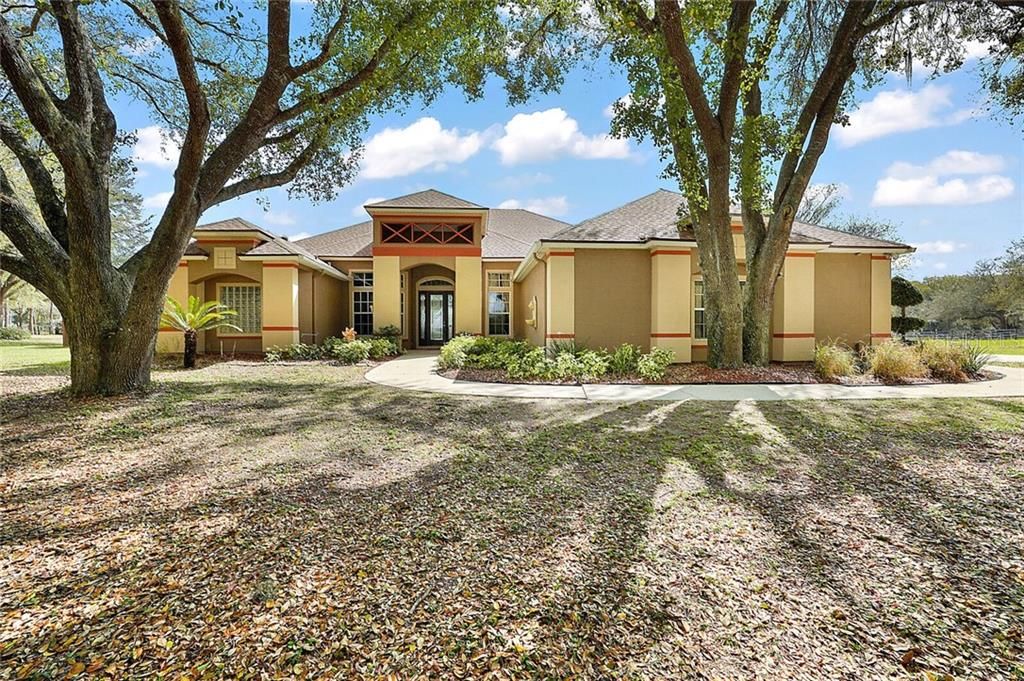 Front Exterior with Majestic Oaks