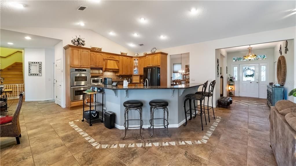 Kitchen Bar/Island open into Family Room