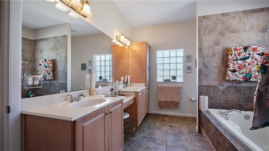 En-Suite Bathroom - Vanities, Make-up Area and Custom Linen/Storage Cabinet