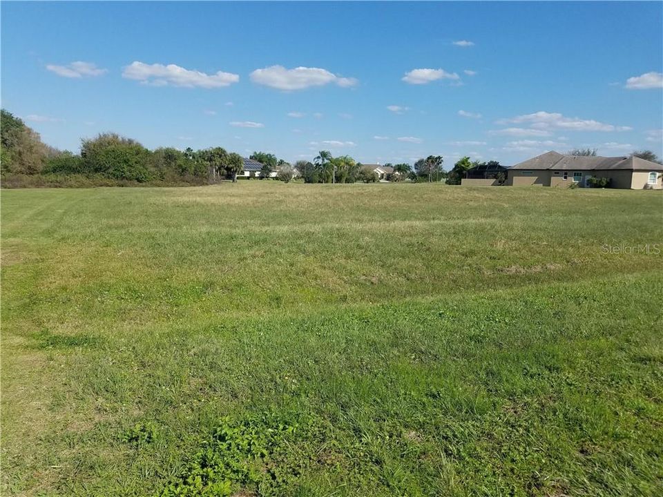 View from Street Looking to Preserve and Water in Distance