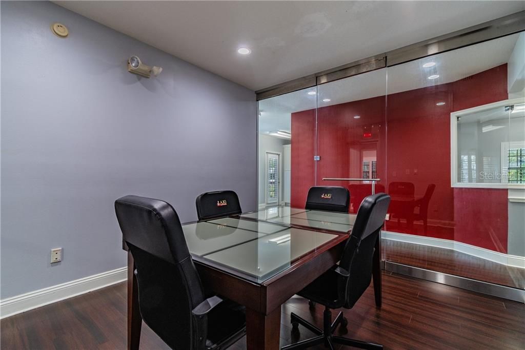 Conference room with glass wall and door