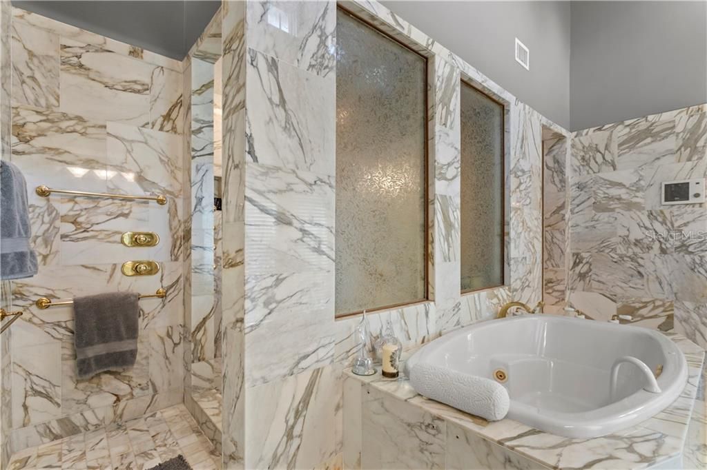 Master bath with gorgeous surround marble
