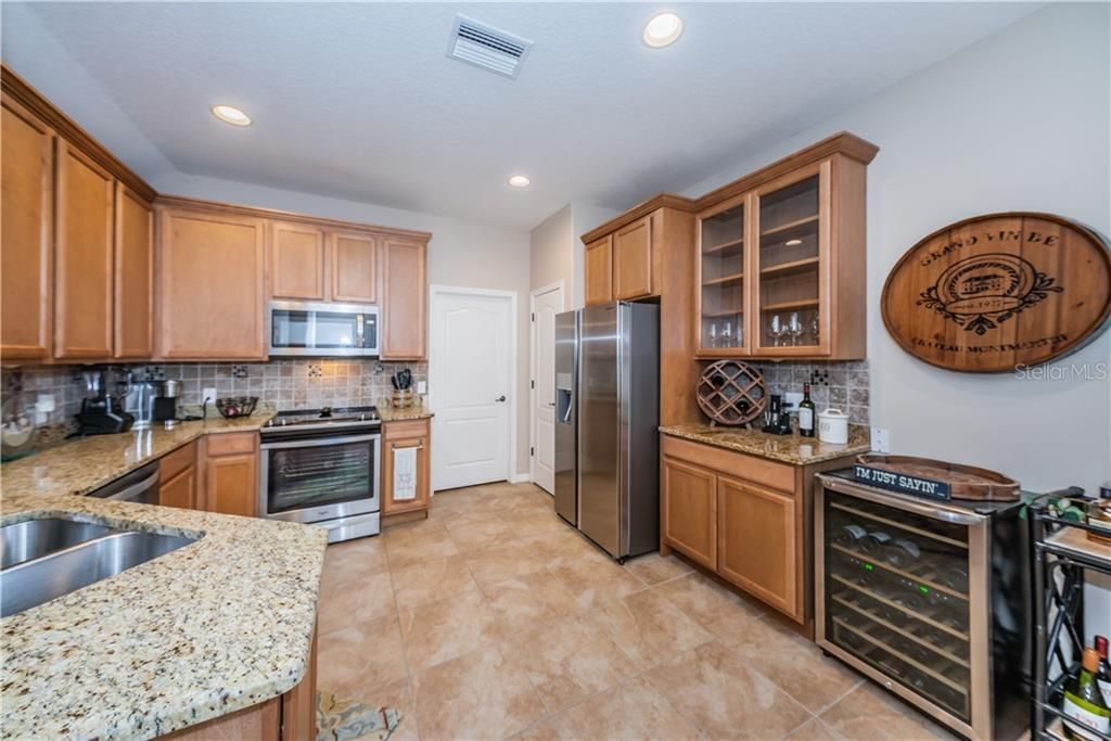 Laundry room located right off the kitchen