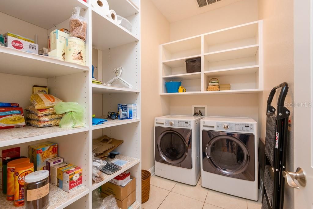 Walk in pantry and laundry area, more storage!