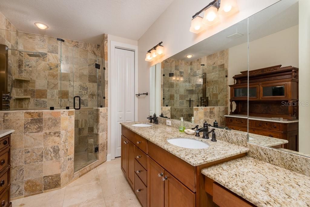 Prepare to pamper yourself in this beautifully updated master bath.