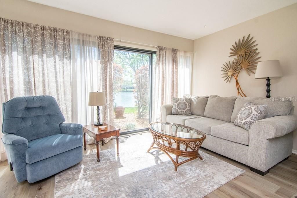 Bonus Family Room enjoys wonderful views overlooking the lake and includes updated laminate flooring.