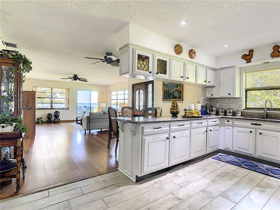 Kitchen with view of living room and Tampa Bay