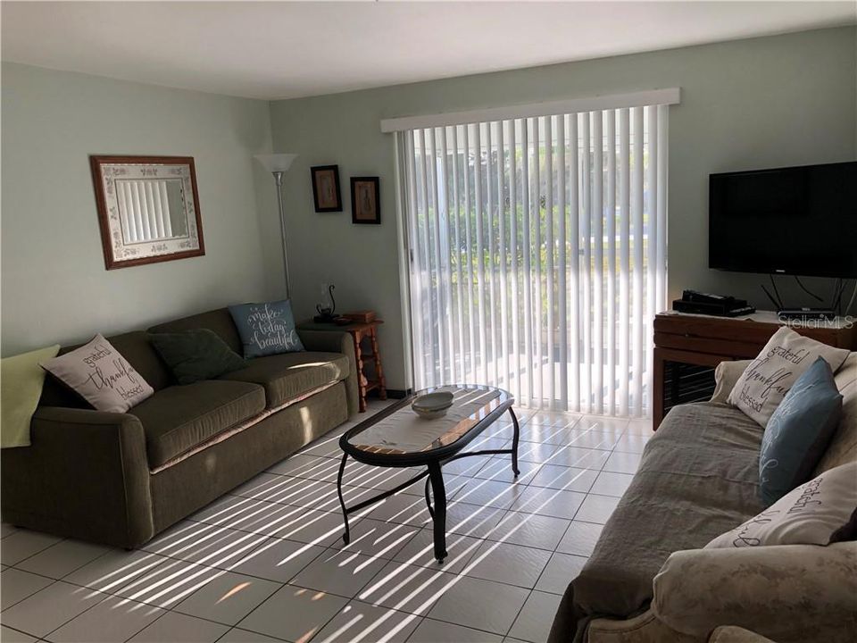 Living Room looking out at Front Lanai