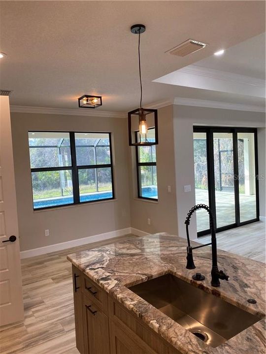 Breakfast nook and large closet pantry in kitchen. Recessed can lighting throughout the interior and exterior of the home and additional exterior soffit lighting