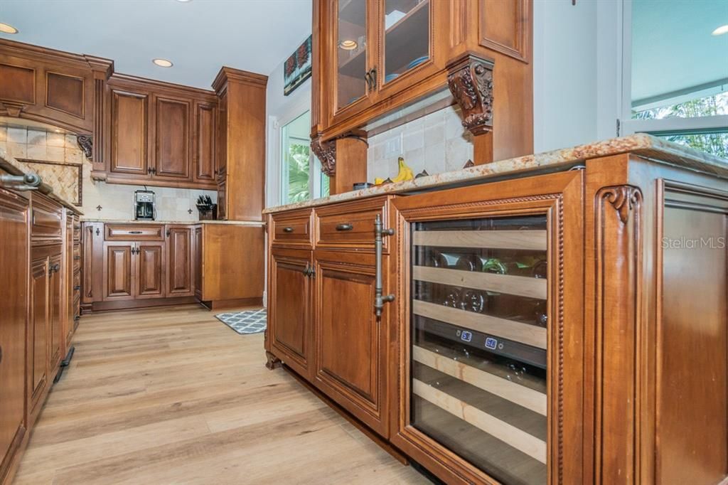 Fine finishes and details including built-in wine cooler.