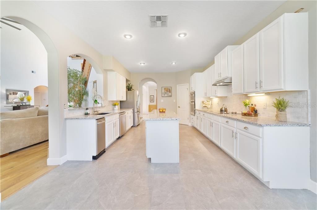 Huge kitchen view from nook.