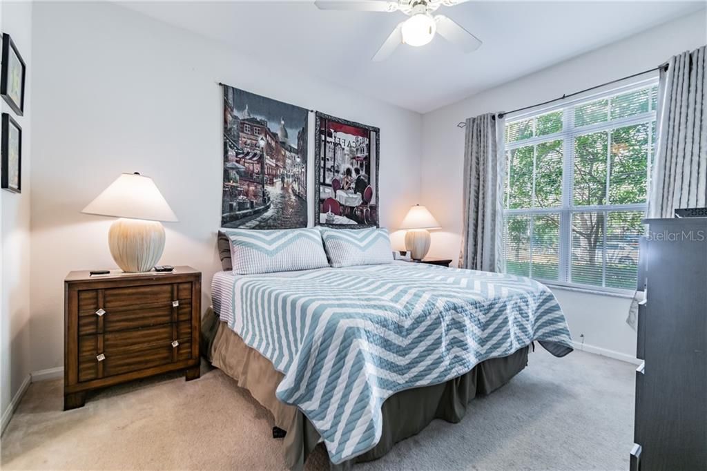 Beautiful master bedroom with access to the patio & the bathroom!