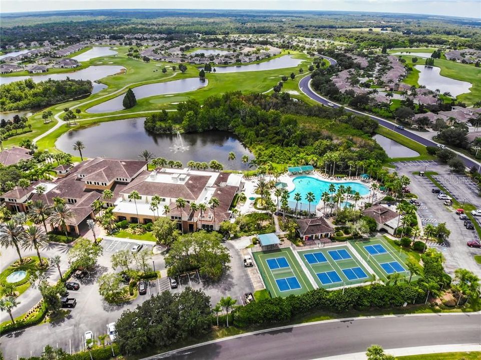 Main northern clubhouse complex with fitness center, pool, spa, tennis courts and a wide variety of social clubs!