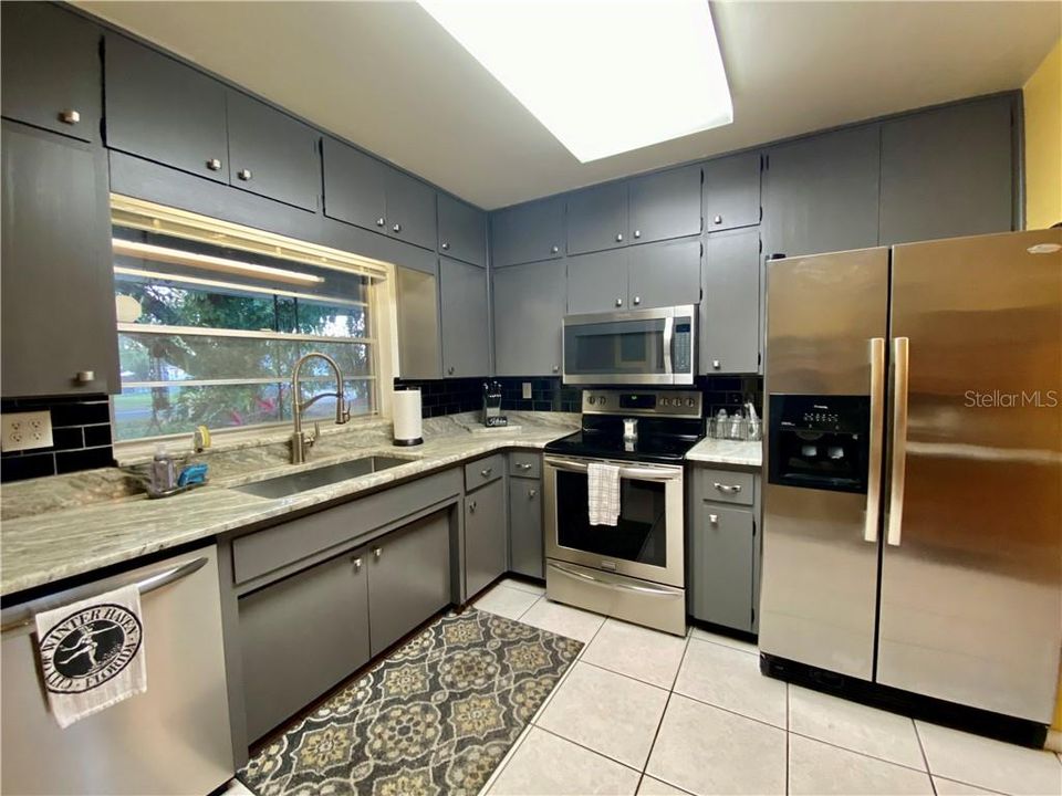 Kitchen with stainless appliances and granite countertops