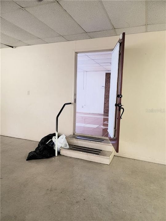 DOOR FROM  STUDIO AREA TO FRONT OFFICE