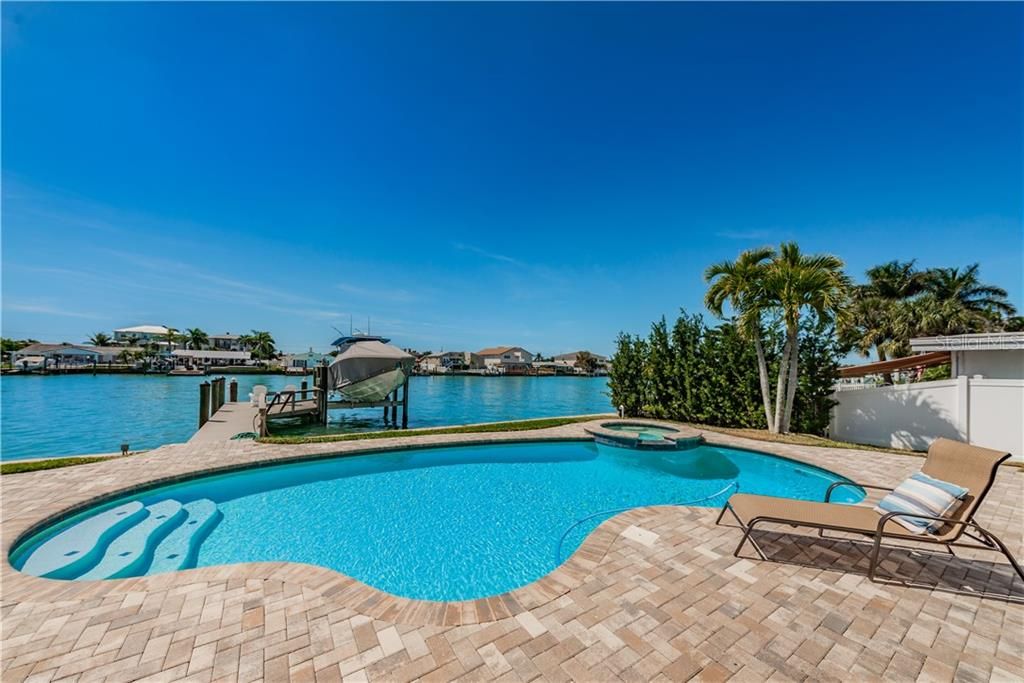 Pool/spa, paver decking, private dock.