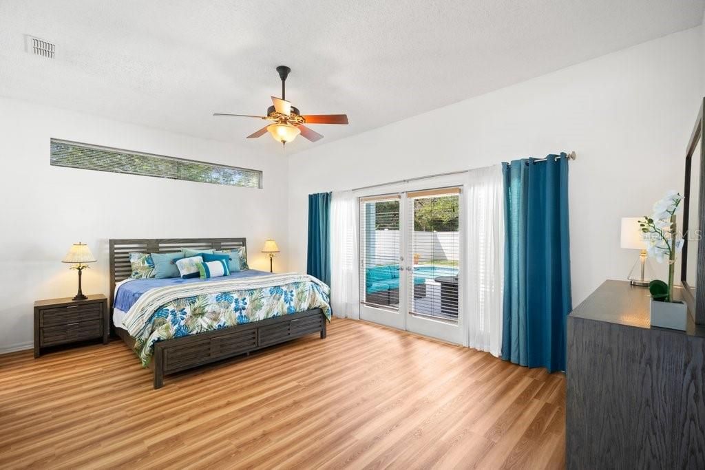 Spacious Master Suite with french doors to the pool