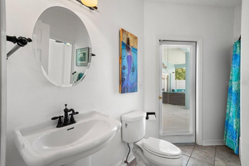 Guest Bath has private door to Guest Room 1... it also offers poolside access.