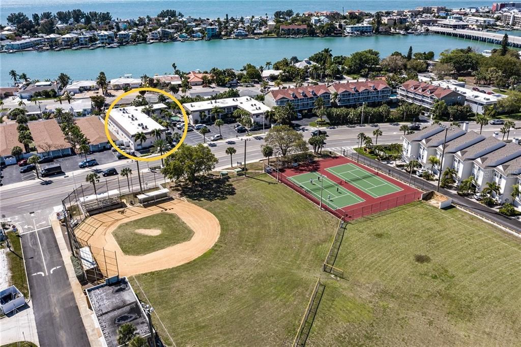 Aerial view of location! Across from tennis courts, boat launch and baseball field.
